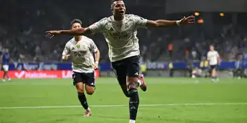 OVIEDO, SPAIN - AUGUST 24: Kylian Mbappe of Real Madrid celebrates scoring his team's opening goal during warm up prior to the LaLiga EA Sports match between Real Oviedo and Real Madrid CF at Carlos Tartiere on August 24, 2025 in Oviedo, Spain. (Photo by Denis Doyle/Getty Images)
