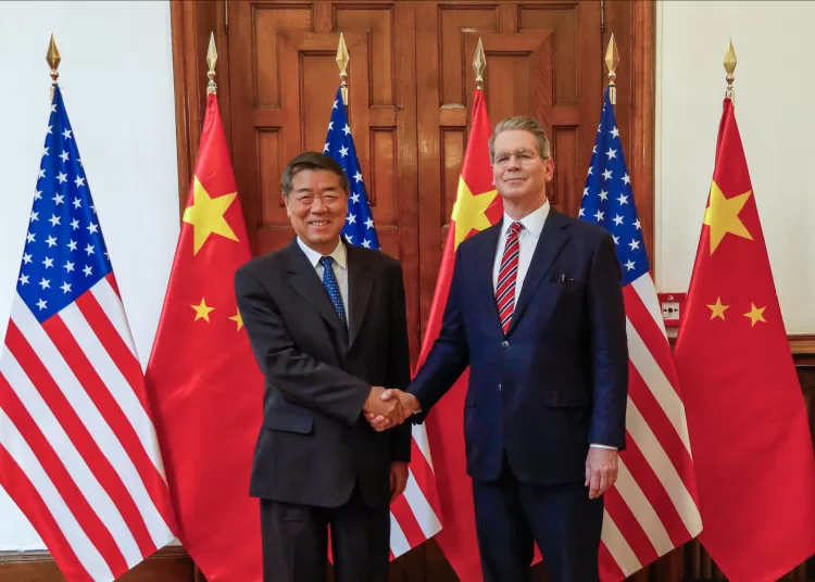 This handout photo obtained on September 15, 2025, from the US Treasury Department shows US Secretary of Treasury Scott Bessent (L) meeting with Chinese Vice Premiere He Lifeng (R) in Madrid, Spain, on September 14, 2025. The United States announced Monday a "framework" deal with China to resolve their dispute over TikTok that calls for the Chinese-owned app to pass to US-controlled ownerhip. US Treasury Secretary Scott Bessent announced the agreement after a second day of talks with Chinese Vice Premier He Lifeng in Madrid, which also includes discussions about the wider US-China trade dispute. (Photo by HANDOUT / US Treasury Department / AFP) / RESTRICTED TO EDITORIAL USE - MANDATORY CREDIT "AFP PHOTO /  US DEPARTMENT OF TREASURY / HANDOUT" - HANDOUT - NO MARKETING NO ADVERTISING CAMPAIGNS - DISTRIBUTED AS A SERVICE TO CLIENTS