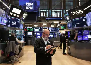 A trader works on the floor at the New York Stock Exchange (NYSE) in New York City, U.S., September 3, 2025. REUTERS/Jeenah Moon/File Photo