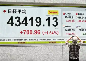 A financial screen in Tokyo shows the 225-issue Nikkei Stock Average setting an intraday record above the 43,400 line on Aug. 13, 2025. (Photo by Kyodo News via Getty Images)