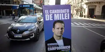 Campaign signage for the La Libertad Avanza party in La Plata, Buenos Aires province, Argentina, on Thursday, Sept. 4, 2025. The upcoming vote in Buenos Aires province is seen by investors as a key signal of what's to come in October, when all of Argentina heads to the polls to renew a large chunk of Congress. Photographer: Tomas Cuesta/Bloomberg via Getty Images