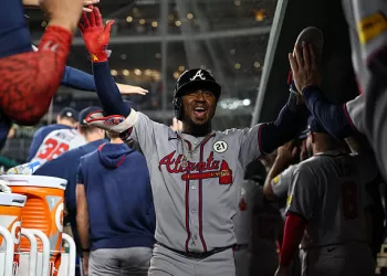 WASHINGTON, DC - SEPTEMBER 15: Ozzie Albies #1 of the Atlanta Braves celebrates with teammates in the dugout after scoring a run against the Washington Nationals during the ninth inning at Nationals Park on September 15, 2025 in Washington, DC. (Photo by Scott Taetsch/Getty Images)