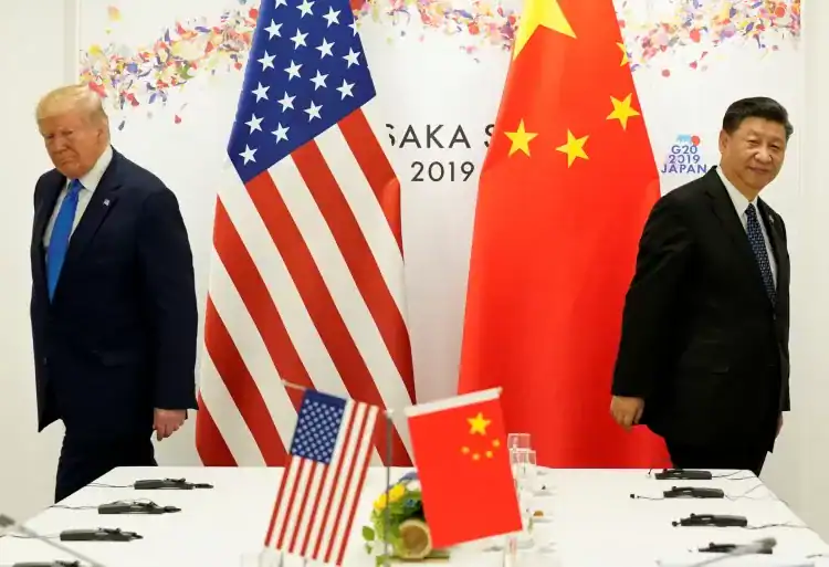 US President Donald Trump attends a bilateral meeting with Chinese President Xi Jinping during the G20 leaders summit in Osaka, Japan, June 29, 2019 [Kevin Lamarque/Reuters]