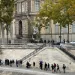 Pedestrians walk on Quai Francois Mitterrand as French police officers stand next to a furniture elevator used by robbers to enter the Louvre Museum, in Paris on October 19, 2025. Robbers broke in to the Louvre and fled with jewellery on October 19, 2025 morning. France's Interior Minister said that jewellery stolen from the Louvre Museum was "priceless". The minister told French news outlets France Inter, France Info and Le Monde that "three or four" thieves had focused on two displays in the exhibition venue's "Gallerie d'Apollon" ("Apollo's Gallery"), completing their broad daylight robbery in just seven minutes. (Photo by Dimitar DILKOFF / AFP)