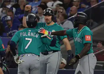TORONTO, ON - OCTOBER 13  -  Seattle Mariners second baseman Jorge Polanco (7) is congratulated after hitting a three-run homer as the Toronto Blue Jays fall the Seattle Mariners 10-3 in game two of the ALCS MLB Playoff series  at Rogers Centre in Toronto. October 13, 2025. (Photo by Steve Russell/Toronto Star via Getty Images)