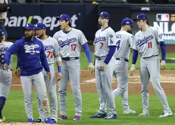 Los Angeles Dodgers players gather around the mound after beating the Milwaukee Brewers in Game 1 of the National League Championship Series at American Family Field in Milwaukee, Wisconsin, on Oct. 13, 2025.  (Photo by Kyodo News via Getty Images)