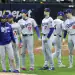 Los Angeles Dodgers players gather around the mound after beating the Milwaukee Brewers in Game 1 of the National League Championship Series at American Family Field in Milwaukee, Wisconsin, on Oct. 13, 2025.  (Photo by Kyodo News via Getty Images)