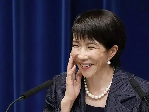 Japan's new Prime Minister Sanae Takaichi smiles during her first press conference after the inauguration of her Cabinet at the premier's office in Tokyo on Oct. 21, 2025. (Photo by Kyodo News via Getty Images)
