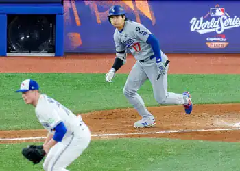 TORONTO, CANADA- OCTOBER 25, 2025: Los Angeles Dodgers Shohei Ohtani (17) runs with what's left of his bat after hitting a broken-bat single against Toronto Blue Jays pitcher Louis Varland (77) in the eighth inning during Game 2 of the World Series at Roger Centre on October 25, 2025 in Toronto, Canada.(Gina Ferazzi / Los Angeles Times via Getty Images)