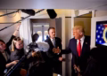 IN FLIGHT - OCTOBER 30: U.S. Trade Representative Jamieson Greer and President Donald Trump speak to members of the media aboard Air Force One on October 30, 2025 in flight. Trump is returning to Washington following a high-stakes meeting with Chinese President Xi Jinping, alongside securing trade deals with ASEAN, Japanese and South Korean partners on his week-long Asian tour. (Photo by Andrew Harnik/Getty Images)
