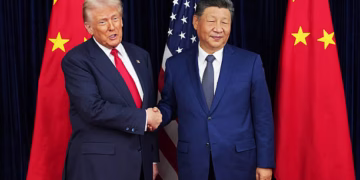 BUSAN, SOUTH KOREA - OCTOBER 30: U.S. President Donald Trump greets Chinese President Xi Jinping ahead of a bilateral meeting at Gimhae Air Base on October 30, 2025 in Busan, South Korea. Trump is meeting Xi for the first time since taking office for his second term, following months of growing tension between both countries. (Photo by Andrew Harnik/Getty Images)