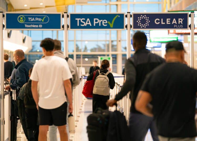 People at the Reagan National Airport security line in Arlington, Virginia, on day 40 of the government shutdown, on November 9, 2025. Hundreds of flights were canceled across the United States on Friday after the Trump administration ordered reductions to ease strain on air traffic controllers who are working without pay amid congressional paralysis on funding the US budget. Forty airports were due to slow down, including the giant hubs in Atlanta, Newark, Denver, Chicago, Houston and Los Angeles. (Photo by Allison ROBBERT / AFP)