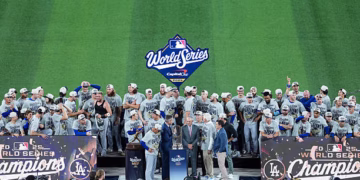 TORONTO, ON - NOVEMBER 01: The Los Angeles Dodgers are presented with the Commissioner's Trophy after winning Game Seven of the 2025 World Series presented by Capital One between the Los Angeles Dodgers and the Toronto Blue Jays at Rogers Centre on Saturday, November 1, 2025 in Toronto, Ontario, Canada. The Los Angeles Dodgers won 5-4 in extra innings. (Photo by Thomas Skrlj/MLB Photos via Getty Images)