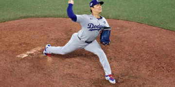 TORONTO, ONTARIO - NOVEMBER 01: Yoshinobu Yamamoto #18 of the Los Angeles Dodgers pitches against the Toronto Blue Jays during the tenth inning in game seven of the 2025 World Series at Rogers Center on November 01, 2025 in Toronto, Ontario. (Photo by Patrick Smith/Getty Images)