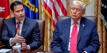 Marco Rubio, US secretary of state, left, and US President Donald Trump during a cabinet meeting at the White House in Washington, DC, US, on Tuesday, Dec. 2, 2025. Trump said he plans to announce his selection to lead the Federal Reserve in early 2026, fueling further speculation about the next leader of the US central bank. Photographer: Yuri Gripas/CNP/Bloomberg via Getty Images