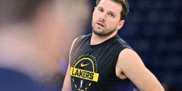 ORLANDO, FLORIDA - MARCH 21: Luka Doncic #77 of the Los Angeles Lakers warms up prior to a game against the Orlando Magic at Kia Center on March 21, 2026 in Orlando, Florida. NOTE TO USER: User expressly acknowledges and agrees that, by downloading and or using this photograph, User is consenting to the terms and conditions of the Getty Images License Agreement. (Photo by Julio Aguilar/Getty Images)