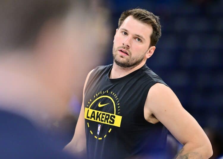 ORLANDO, FLORIDA - MARCH 21: Luka Doncic #77 of the Los Angeles Lakers warms up prior to a game against the Orlando Magic at Kia Center on March 21, 2026 in Orlando, Florida. NOTE TO USER: User expressly acknowledges and agrees that, by downloading and or using this photograph, User is consenting to the terms and conditions of the Getty Images License Agreement. (Photo by Julio Aguilar/Getty Images)