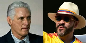 Banderas de Cuba y Colombia frente a edificio gubernamental en La Habana