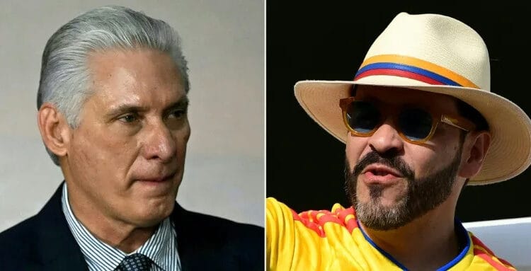 Banderas de Cuba y Colombia frente a edificio gubernamental en La Habana