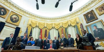 US President Donald Trump, center, during an executive order signing in the Oval Office of the White House in Washington, DC, US, on Monday, July 13, 2026. Trump shrank Utah's Bears Ears and Grand Staircase-Escalante national monuments Monday, opening the door to possible drilling, mining, and other development on formerly-protected lands. Photographer: Aaron Schwartz/CNP/Bloomberg via Getty Images