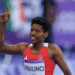 La atleta dominicana Marileidy Paulino corriendo en una pista de los 400 metros planos