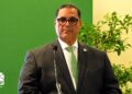 José Peña Santana de la Fuerza del Pueblo durante conferencia sobre aranceles y comercio exterior en Hotel El Embajador, Santo Domingo