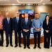 Christopher Paniagua del Banco Popular y Juan Manuel Méndez García del COE en la entrega del Salón de Comunicaciones remozado