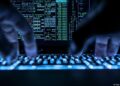 Pantalla con código informático y mapa de Alemania, representando ciberataques y espionaje industrial