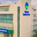 Fachada de Banco Santa Cruz en República Dominicana con logo institucional visible