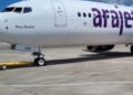 Avión de Arajet en pista de aeropuerto durante operaciones de temporada alta