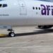Avión de Arajet en pista de aeropuerto durante operaciones de temporada alta