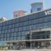 Logo de Visa junto a representación visual de seguridad digital y detección de fraude con inteligencia artificial