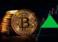 Pantalla mostrando el precio del bitcoin superando los 86,000 dólares con gráfica de tendencia alcista
