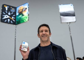 John Ternus, chief executive officer of Apple Inc., holds the iPhone Duo smartphone during a product unveiling event at Apple Park in Cupertino, California, US, on Wednesday, Sept. 9, 2026. Apple Inc. unveiled the company's first foldable smartphone during a wide-ranging event Wednesday, betting that a new category can energize growth for its biggest-selling lineup. Photographer: David Paul Morris/Bloomberg via Getty Images