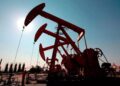 Pantalla mostrando el precio del petróleo WTI por encima de 91 dólares en la Bolsa de Nueva York
