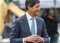 Sala de operaciones en Wall Street con pantallas mostrando la subida de rendimientos de bonos del Tesoro de EEUU