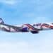 Avión de Arajet en pista de aterrizaje con la bandera dominicana visible en la cola de la aeronave