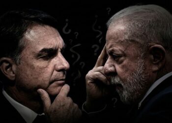 Urnas electorales en Brasil con banderas del país al fondo durante las elecciones del 4 de octubre
