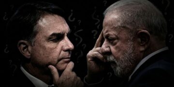 Urnas electorales en Brasil con banderas del país al fondo durante las elecciones del 4 de octubre