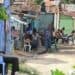 Trabajadores en una calle de Santo Domingo, República Dominicana, representando la pobreza laboral que afecta al 39.7% de la población