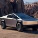Vehículos Tesla eléctricos alineados en un centro de distribución durante el tercer trimestre de 2026