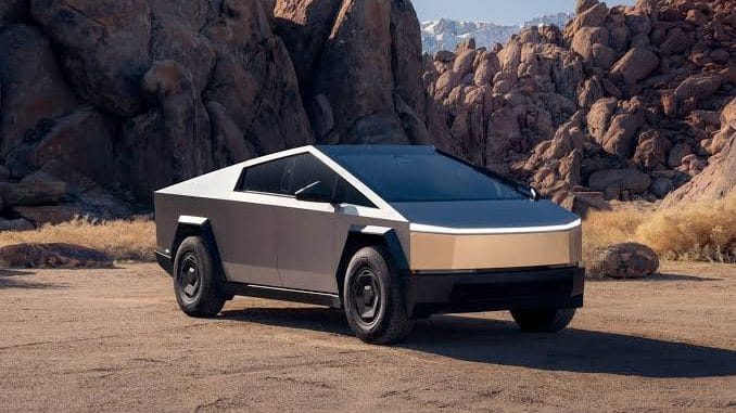 Vehículos Tesla eléctricos alineados en un centro de distribución durante el tercer trimestre de 2026